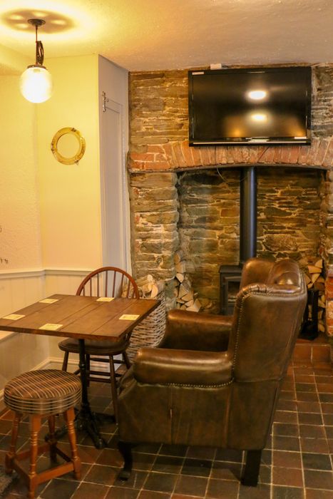 Dining table by the window inside The Kings Arms